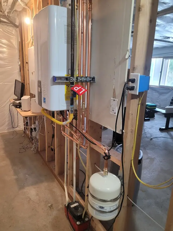 Licensed plumber repairing a kitchen sink in Brevard